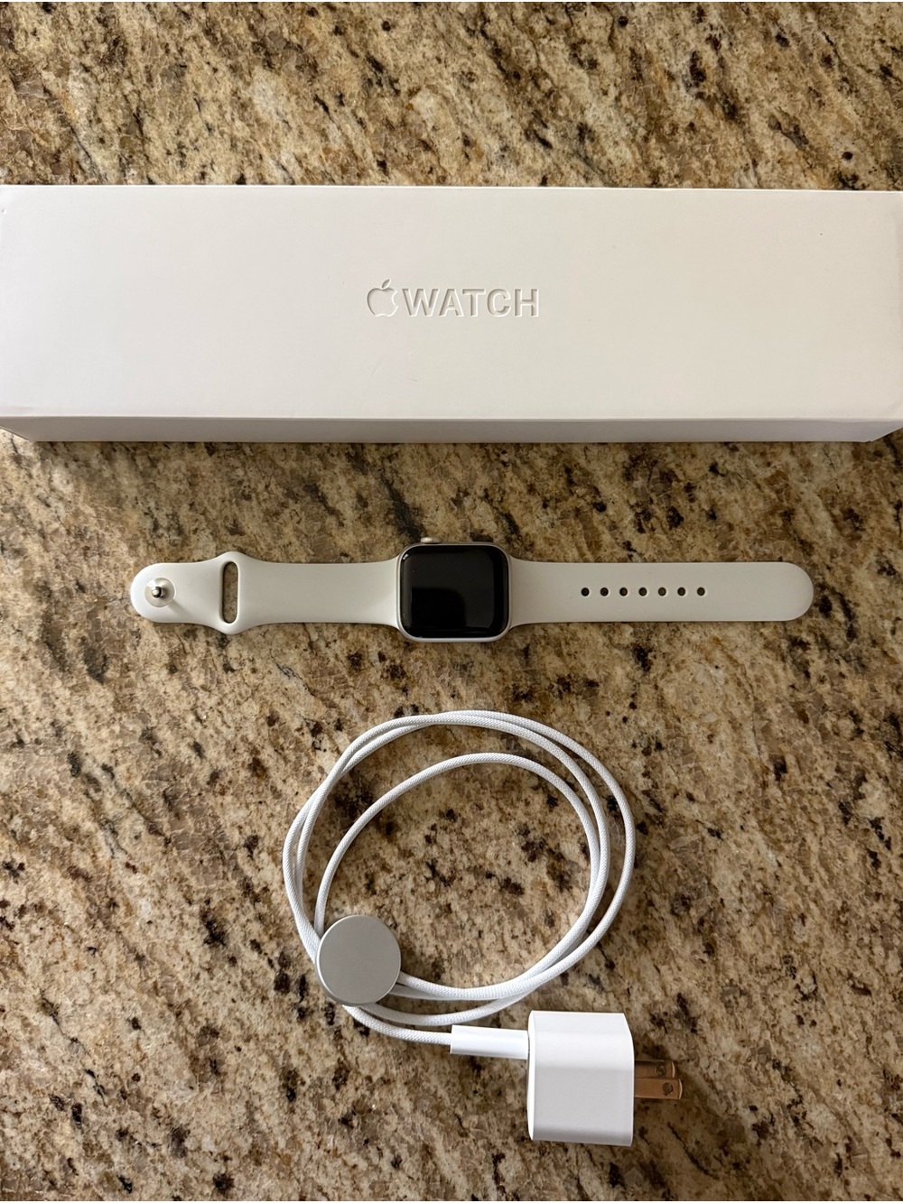 Silver 40MM Apple Watch with White Sport Band and Charger